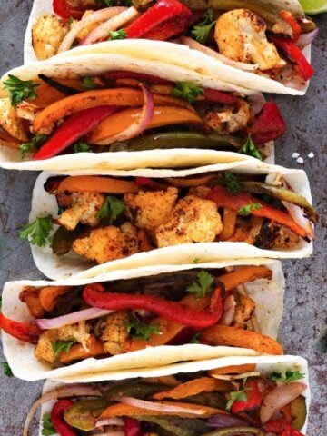 five cauliflower tacos with fajita veggies
