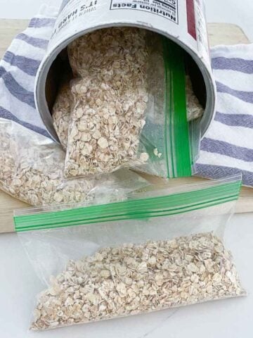 An oat canister with instant oatmeal in zip bags