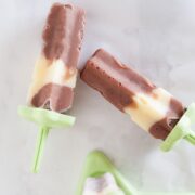close up of two banana chocolate pudding pops
