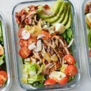 chicken cobb salad in a glass lunch container