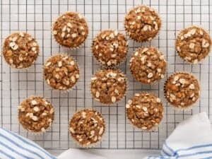 overhead view of banana oat muffins cooling on a cooling rack
