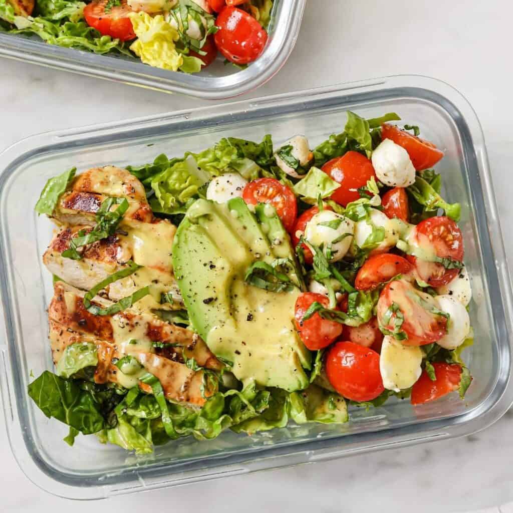 blackened chicken salad on a meal prep lunchbox