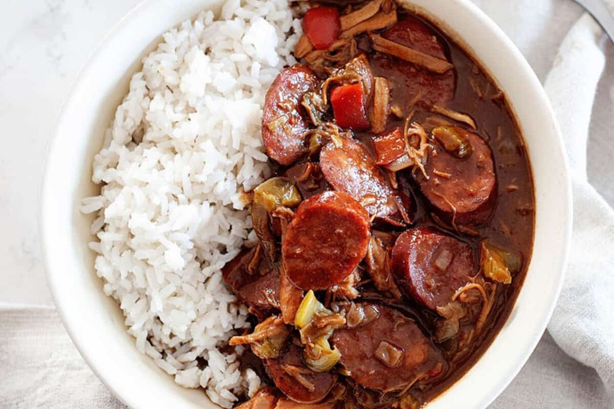 large bowl of chicken sausage gumbo with rice