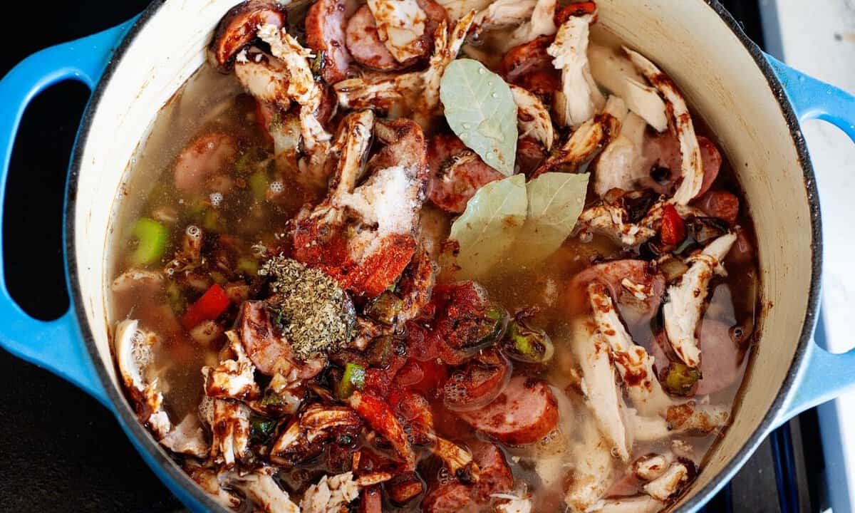 chicken gumbo ingredients in a large pot